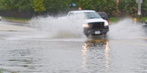 Florida deputy and motorist survive being swept through storm drain amid huge rainstorm